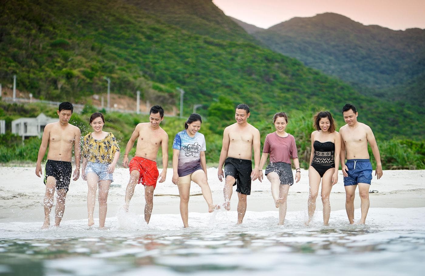 Asian toursists on beach 